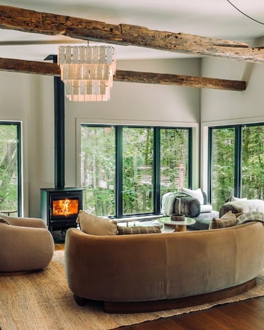 Living room with fireplace at Muddy Brook